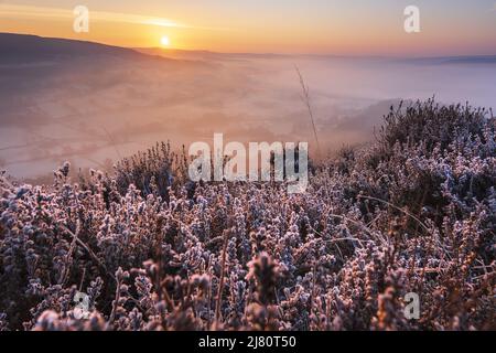 UK landscape photographer John Finney captured this stunning misty sunrise this morning over Win Hill in the Derbyshire Peak District, Derbyshire United Kingdom Featuring: Winhill and Bamford sunrise, Peak District. UK Where: Derbyshire, United Kingdom When: 01 Mar 2021 Credit: John Finney/WENN Stock Photo