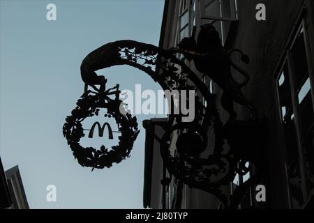 Silhouette of the McDonalds sign on the famous Linzergasse street Stock Photo