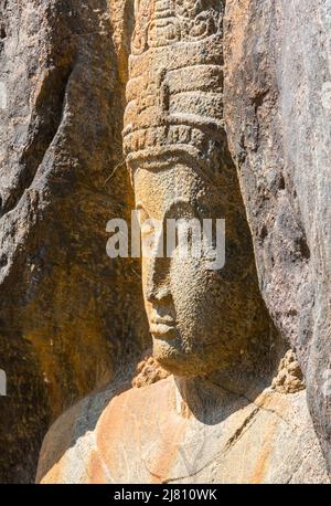 Carved Buddhist Sculpture Rock in Buduruvagala (UNESCO World Heritage Site),  Sri Lanka, South Asia Stock Photo