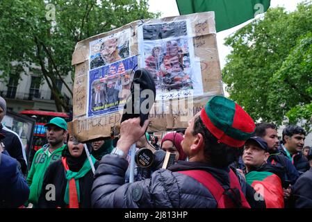 London, UK, 11th May, 2022. Pakistan's Prime Minister Shehbaz Sherif visits the Capital for an emergency meeting with his older brother - and also former leader of the country, Nawaz Sherif to discuss the political situation in the country. Supporters of imran Khan, mostly aligned with his political party PTI organised a protest outside Stanhope House, where the elder Sherif's son Hassan has an office. Khan supporters overseas, and in Pakistan call for a reinstatement of his premiership or elections to be held. Counter-demonstrators welcomed the premier's visit and held placards denouncing Kha Stock Photo