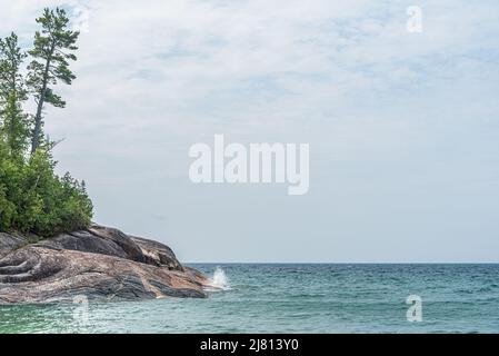 Rocky promontory in Superior Lake Park. Canada Stock Photo