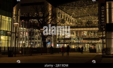 Gdansk Poland - April 2022. Forum gallery shopping mall at night. Modern shopping and entertainment centre. Architecture in the city center of Gdansk is the historical capital of Polish Pomerania with medieval old town architecture Stock Photo