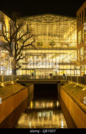 Gdansk Poland - April 2022. Forum gallery shopping mall at night. Modern shopping and entertainment centre. Architecture in the city center of Gdansk is the historical capital of Polish Pomerania with medieval old town architecture Stock Photo