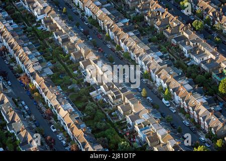 File photo dated 13/08/17 of an aerial view of terraced houses in south west London. There is little evidence' that the pace of house price growth is losing much momentum, despite surging living costs, according to surveyors. A limited supply of available properties and a steady growth in demand from buyers remain the overriding drivers of house prices, the Royal Institution of Chartered Surveyors (Rics) said.Issue date: Thursday May 12, 2022. Stock Photo