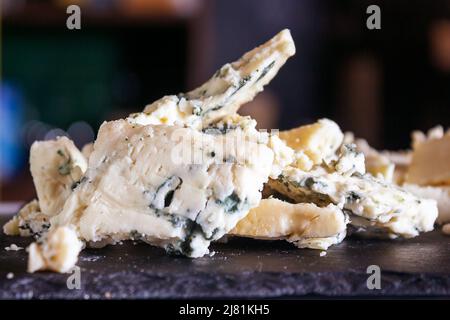 Cheese shop. Roquefort. Selective focus. Close up. Stock Photo