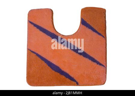 Close up of non slip orange blue fluffy soft bath mat or rug isolated on white background. Bath Accessories. Top view. Stock Photo