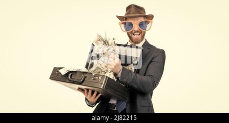 Being rich. Rich man isolated on white. Happy showman hold suitcase with money. Cash prize Stock Photo