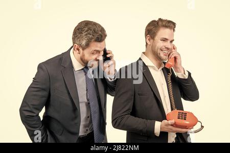 What can we do for you. Modern boss and old-fashioned boss. Modern and classic communication Stock Photo