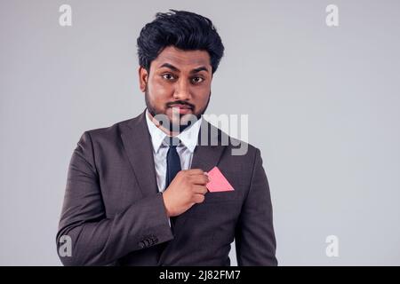 indian business man with credit card at studio white background,black friday sales Stock Photo