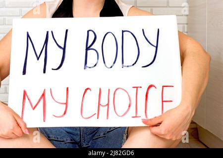 Woman holding a placard with My Body My Choice text. Reproductive women and pro-abortion rights protest concept. Stock Photo