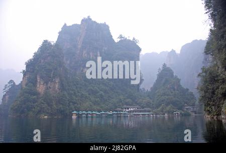 Zhangjiajie National Forest Park, Hunan Province, China: Baofeng Lake and misty mountains in Zhangjiajie. Stock Photo