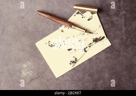 Top view of an old photograph scrapbook album with a tied string