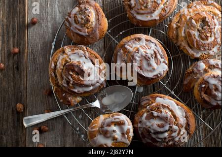 Cinnamon rolls on wooden table background Stock Photo