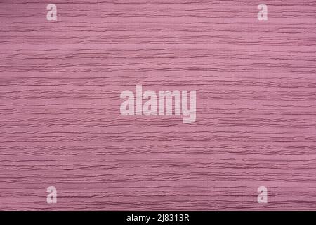 cotton pink color fabric abstract, background texture, textile backdrop or wallpaper closeup, flat lay Stock Photo