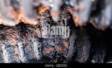 Tar and soot on the pipes of a solid fuel boiler close-up Stock Photo