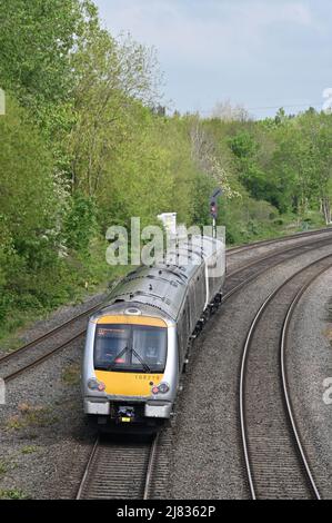 A Chiltern Railways Class 168 Diesel Multiple Unit heading northbound after departing from Banbury Station in north Oxfordshire Stock Photo