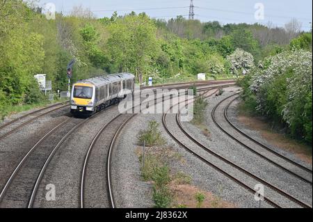 A Chiltern Railways Class 168 Diesel Multiple Unit heading northbound after departing from Banbury Station in north Oxfordshire Stock Photo
