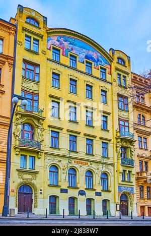 PRAGUE, CZECH REPUBLIC - MARCH 5, 2022: The colorful historic Art Nouveau Hlohol House, decorated with mosaic panel and wall sculptures, on March 5 in Stock Photo