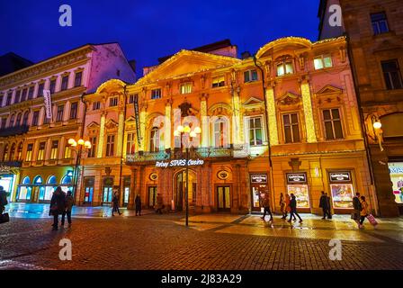 PRAGUE, CZECH REPUBLIC - MARCH 5, 2022: The bright evening illumination of Casino, located on Na Prikope Street, on March 5 in Prague Stock Photo
