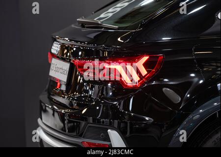 Riga, Latvia, April 29, 2022: LED rear lights and car back design of nev Audi Q3 Sportback , model 2022, car exterior design Stock Photo