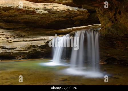 Middle Falls: As the name implies, this is the middle section of Old Man's Cave. This is located in the central Ohio region know as Hocking Hills. Stock Photo