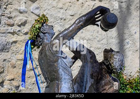 Head-washing fountain at the city wall by Gisela Steimle with Easter decoration, realised 1993, Wangen im Allgaeu, Baden-Wuerttemberg, Germany Stock Photo