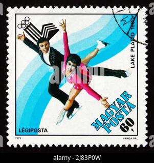 HUNGARY - CIRCA 1979: a stamp printed in the Hungary shows Figure Skating, Winter Olympics Lake Placid 1980, circa 1979 Stock Photo