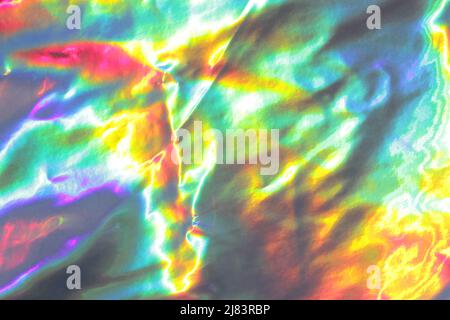 Colorful holographic background. Modern foil, futuristic blurred template. Neon pastel, hologram and rainbow colors. Abstract gradient. Stock Photo