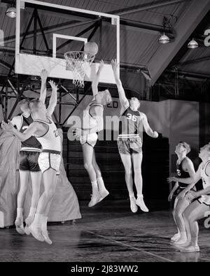 1960s SIX CAUCASIAN TEENAGE BOYS HIGH SCHOOL OR COLLEGIATE AGE BASKETBALL GAME PLAYERS UNDER THE NET JUMPING TO SCORE - s13920 HAR001 HARS SCORE LEAPING ATHLETE LIFESTYLE SATISFACTION HISTORY HEALTHINESS 6 COPY SPACE FULL-LENGTH PHYSICAL FITNESS PERSONS INSPIRATION MALES SIX ATHLETIC PLAYERS B&W SCHOOLS LEAP PROTECTION STRATEGY UNIVERSITIES EXCITEMENT HOOPS THE TO HIGH SCHOOL HIGH SCHOOLS HIGHER EDUCATION CONNECTION TEENAGED COLLEGES OR BALL GAME COLLEGIATE YOUNG ADULT MAN BLACK AND WHITE CAUCASIAN ETHNICITY HAR001 OLD FASHIONED