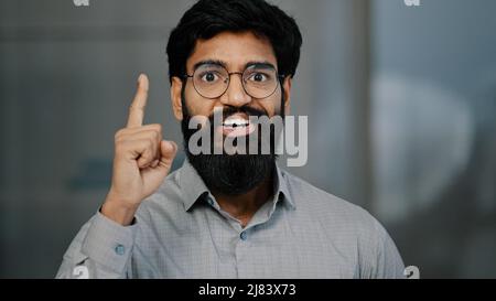 Pensive adult bearded man arabian puzzled businessman deep in thoughts memory concentrate thinking solution of business issue get inspiration creating Stock Photo