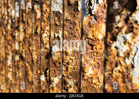 Rusty bridge railing texture background with cracked white paint Stock Photo
