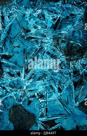 seasonal background or texture abstract shapes on a frozen water surface Stock Photo