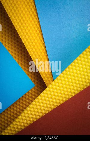 background or texture wax honeycomb and color papers Stock Photo