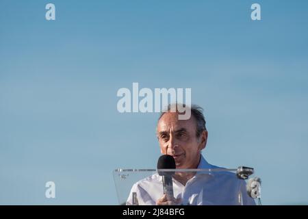 Cogolin, France. 12th May, 2022. Eric Zemmour delivers a speech to make his candidacy official. Eric Zemmour announced in Cogolin (Var) that he is a candidate for the post of deputy of the 4th constituency in the Var in the area of Saint-Tropez. On the beach of the Marines in Cogolin he made his candidacy official in the company of the other candidates of the Reconquete! party. (Photo by Laurent Coust/SOPA Images/Sipa USA) Credit: Sipa USA/Alamy Live News Stock Photo