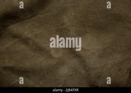 Closeup texture of canvas fabric. Khaki fabric background. Stock Photo