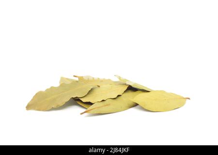 Dried bay laurel leaves or Laurus nobilis spice isolated on white background. Stock Photo
