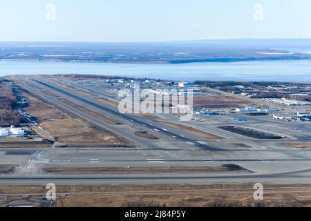 Overview of Anchorage Airport in Alaska. Ted Stevens Anchorage International Airport (PANC) seen from above. Runway of Anchorage Airport. Stock Photo