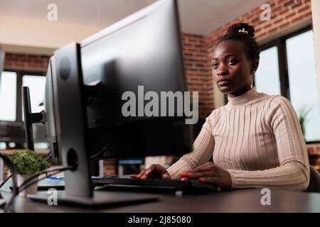 Database server admin updating cloud files processing rate using advanced compression algorithm. High tech engineer encrypting platform informations through peer to peer file sharing ability. Stock Photo