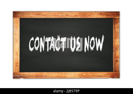 CONTACT  US  NOW text written on black wooden frame school blackboard. Stock Photo