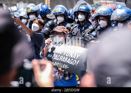Pasay, Metro Manila, Philippines. 13th May, 2022. Protesters in front ...