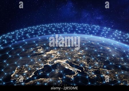 Global telecommunication network above Europe viewed from space. Internet connection and satellite communication technology around the world. Elements Stock Photo