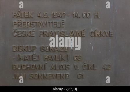 Commemorative plaques with names of the people executed during the Nazi occupation in the area of the Kobylisy Shooting Range (Kobyliská střelnice) in Prague, Czech Republic. The area of the former military shooting range was used for mass executions during the Nazi occupation. Czechoslovak Orthodox Bishop Gorazd (Matěj Pavík) and Orthodox priests Alois Václav Čikl and Jan Sonnenveld listed on the plaque were executed here on 4 September 1942 at 2 p.m. Stock Photo