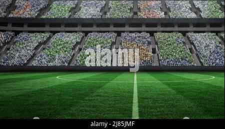 Image of gold confetti falling over sports stadium Stock Photo