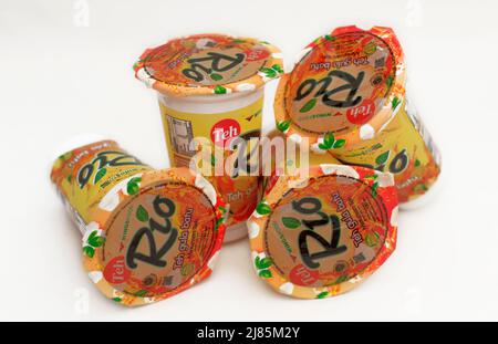 Kaliwungu, Indonesia - 03 May 2022: Teh Rio - Tea packaging in plastic cups. plastic cup tea on white background Stock Photo