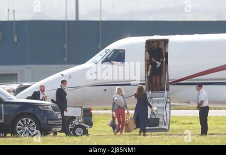 William & Kate Glasgow Airport. Kate boarded a private jet while William jumped on helicopter. Stock Photo