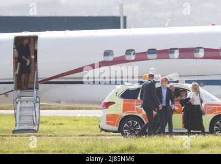 William & Kate Glasgow Airport. Kate boarded a private jet while William jumped on helicopter. Stock Photo