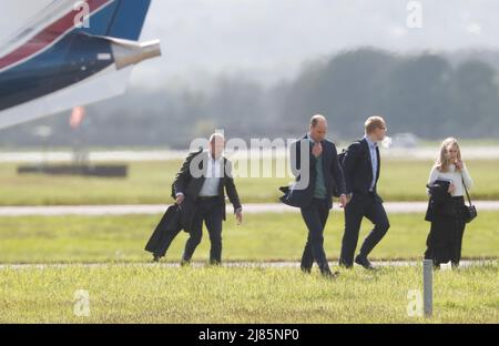 William & Kate Glasgow Airport. Kate boarded a private jet while William jumped on helicopter. Stock Photo