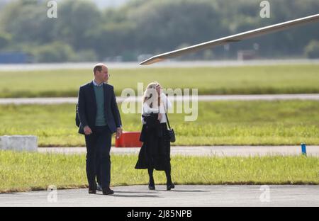 William & Kate Glasgow Airport. Kate boarded a private jet while William jumped on helicopter. Stock Photo