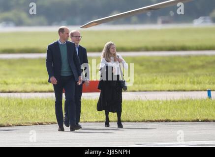 William & Kate Glasgow Airport. Kate boarded a private jet while William jumped on helicopter. Stock Photo