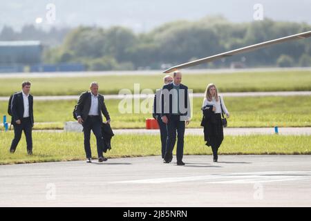 William & Kate Glasgow Airport. Kate boarded a private jet while William jumped on helicopter. Stock Photo